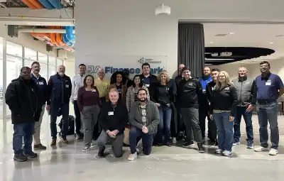 Capital Bank volunteers standing in a posed picture.